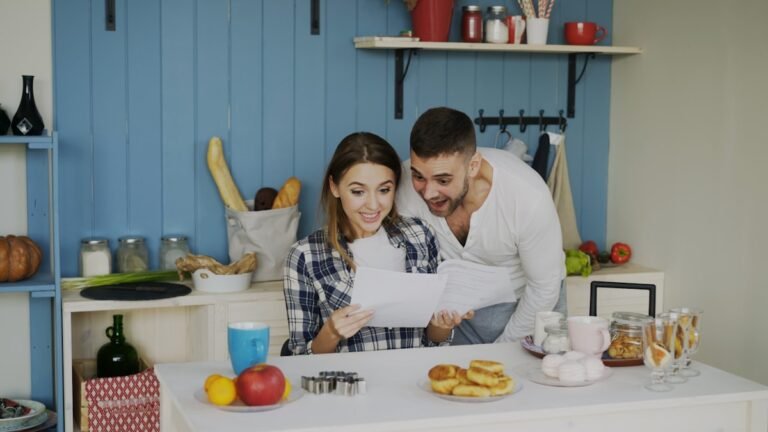 Couple reviewing FHA loan mortgage paperwork together at home in Texas