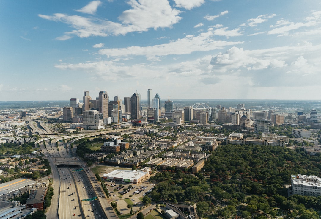 Dallas Texas skyline representing buying a home in the urban core versus the suburbs